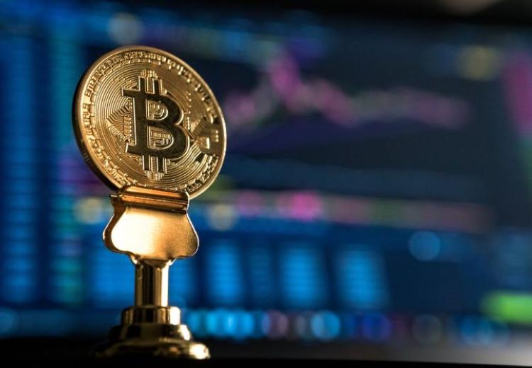 Image of bitcoin represented as a physical coin